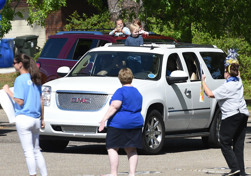 Teachers hold parade for students at Houston Academy